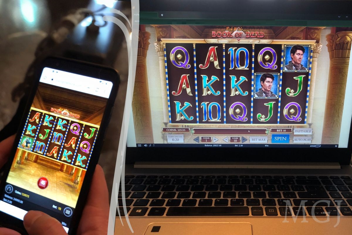 iGaming Platform - Laptop and Mobile Phone Slot Game Book of Dead - PNG - Mia's Gaming Journey